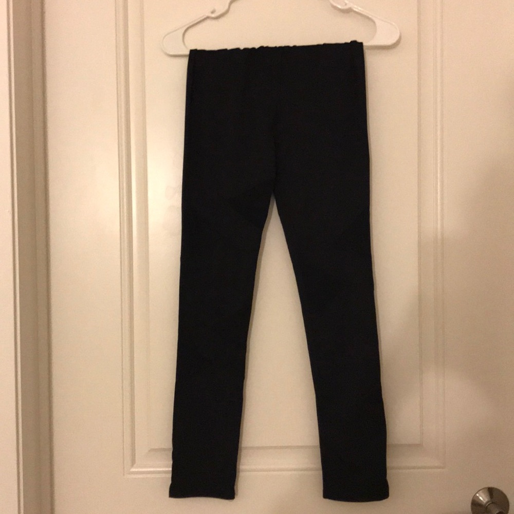 Black spandex leggings with mesh panels